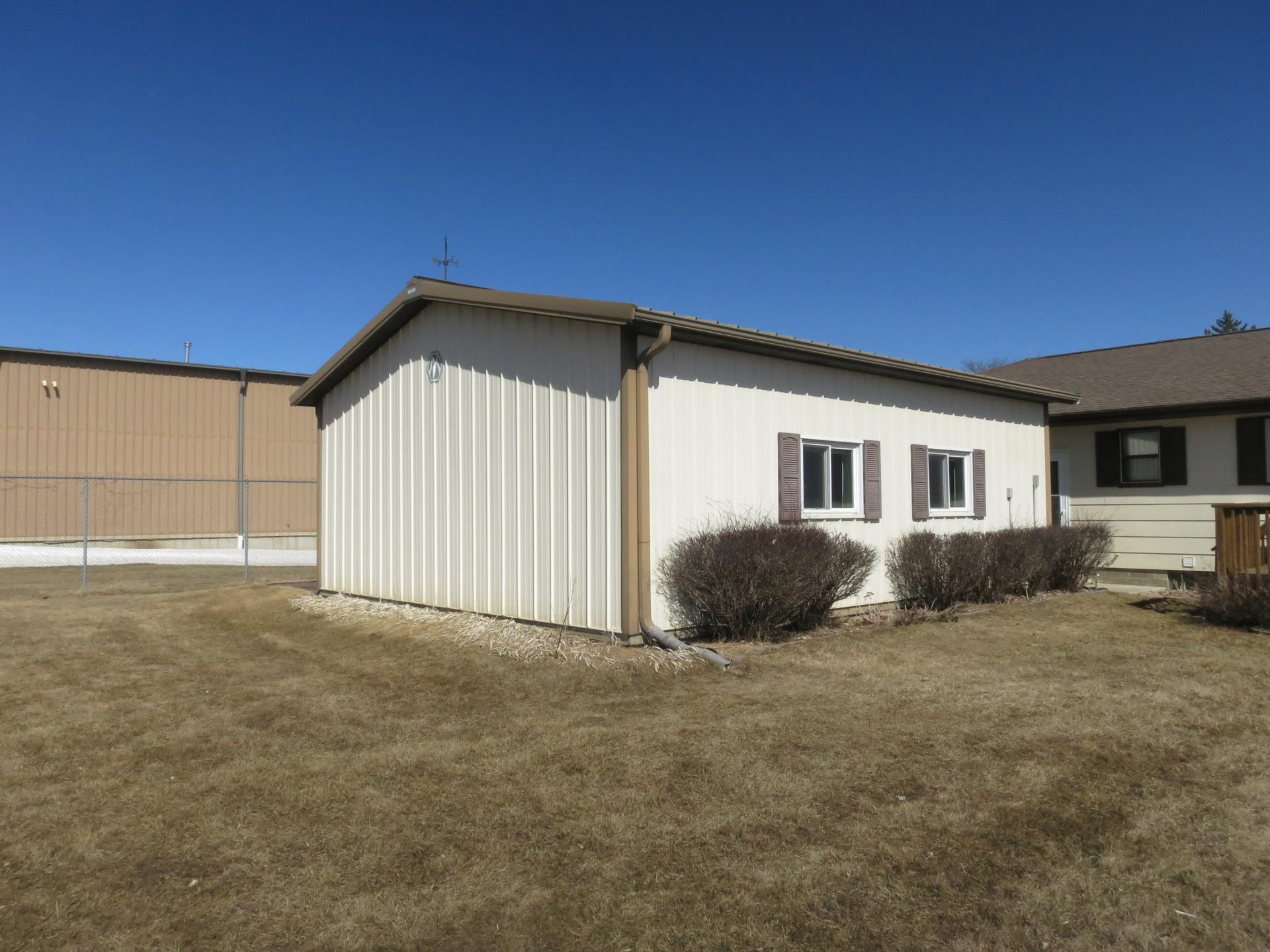 Home and 3 buildings to be moved Dickinson County Milford Midwest