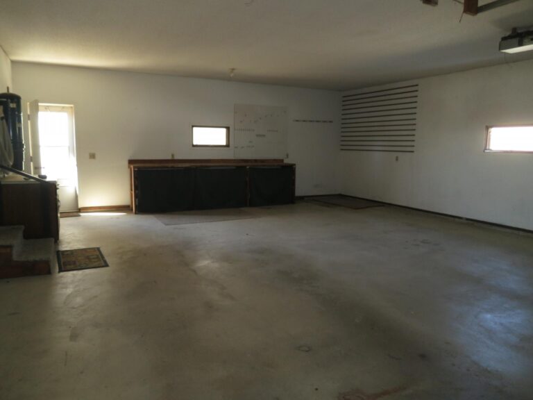 Home and 3 buildings to be moved-Garage 2-1553703914