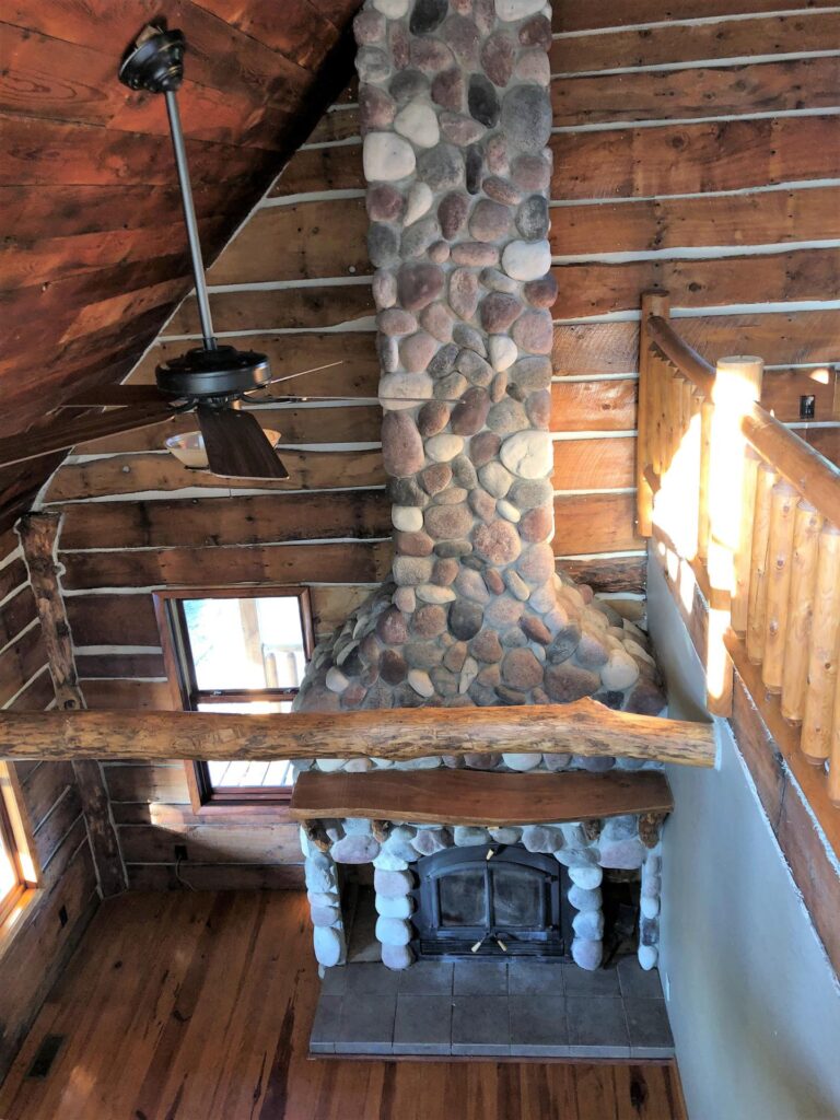 Log Home on 30.1 Surveyed Acres-fireplace-1570645618